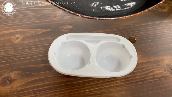 Pour the batter into the container until it's about half full.