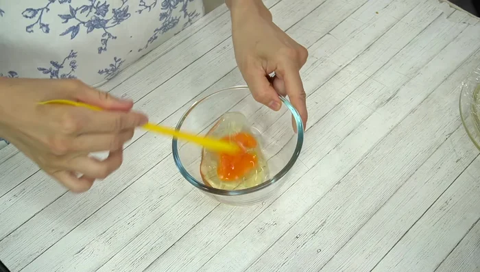 Whisk the eggs: Crack eggs into a bowl and whisk well. Season with salt and pepper if desired.