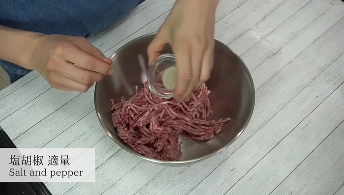 In a bowl, combine ground meat, salt, pepper, and knead until slightly sticky.