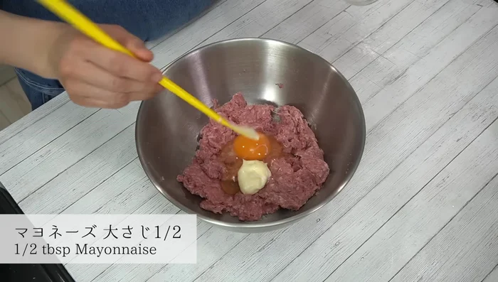 Add eggs, mayonnaise, and softened breadcrumbs to the meat mixture. Mix thoroughly.