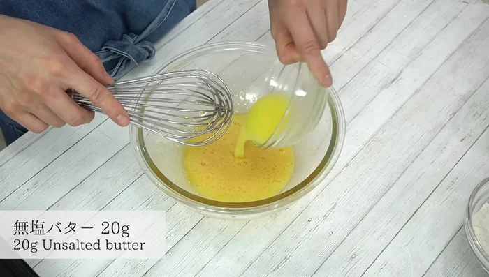 Add melted butter and mix well.