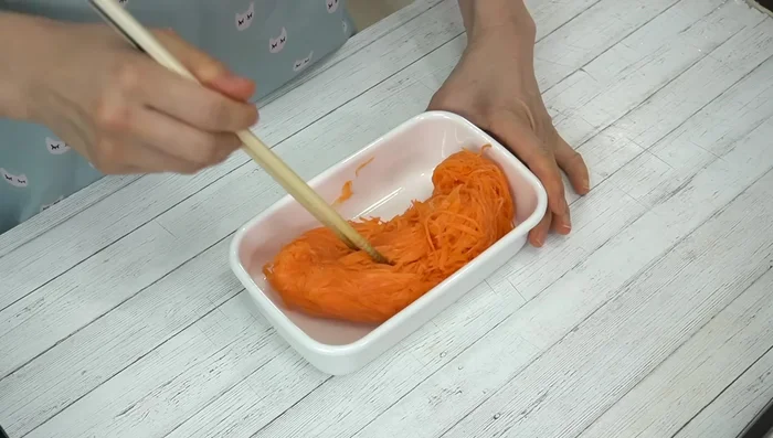 Marinate: Transfer the carrots to a storage container. Pour the vinegar mixture over the carrots and drizzle with olive oil. Mix gently to coat the carrots evenly.