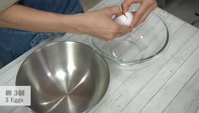 Separate eggs into whites and yolks. Keep egg whites in a larger bowl and chill until ready to use.