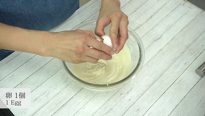 Crack the eggs into the tofu mixture and mix well.