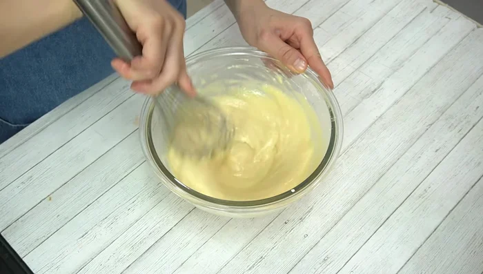 Add the baking powder and mix well. The batter is ready.