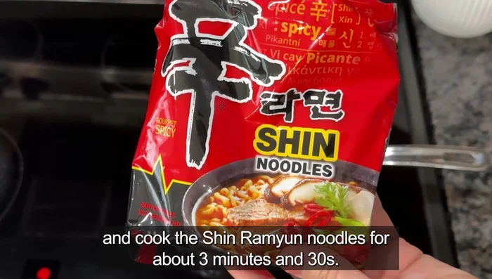 Bring a pot of water to a boil and cook the shin ramen noodles for about 3 minutes and 30 seconds. Cook them al dente, nice and chewy, not too soft.