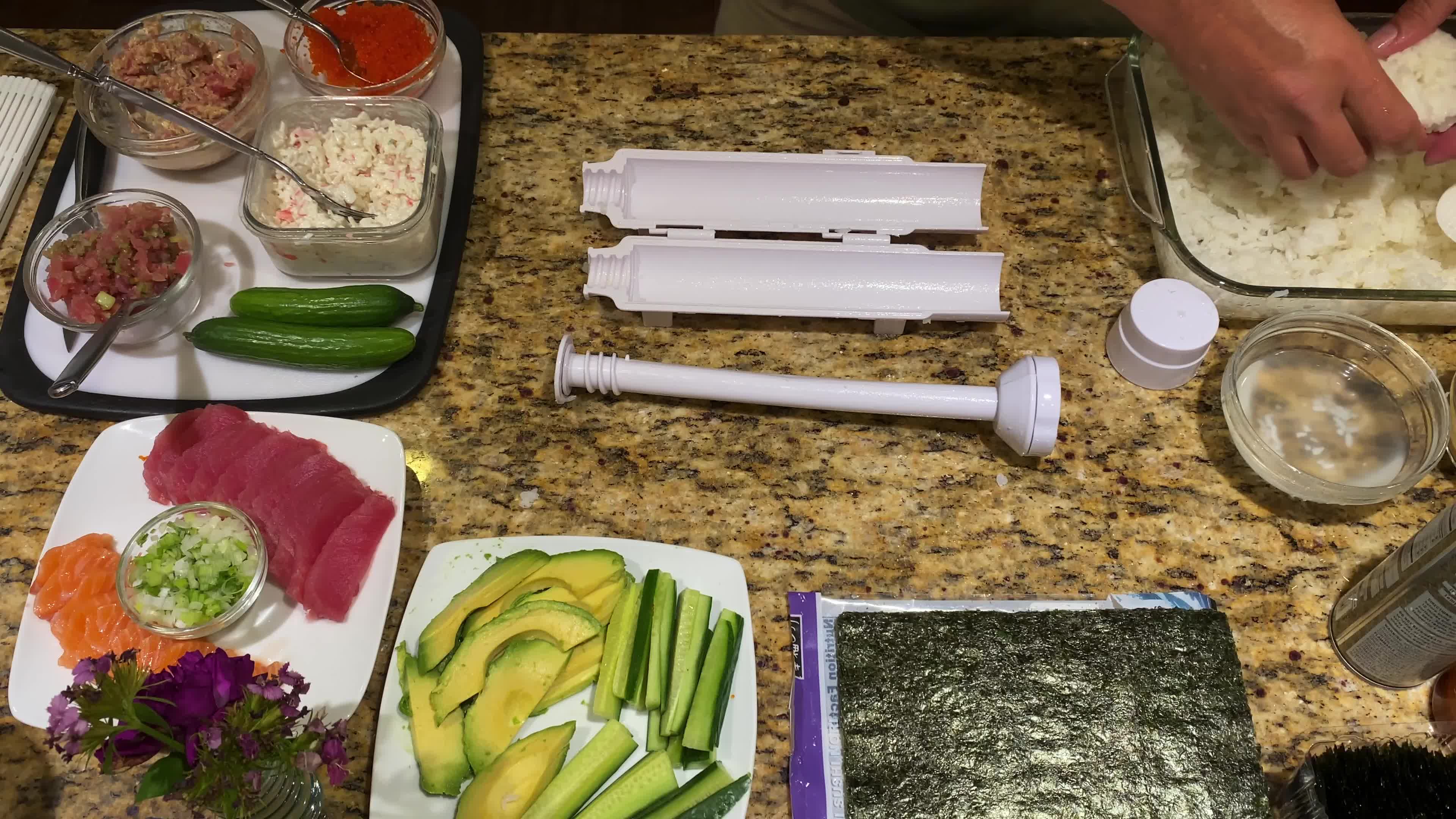 Adding sushi rice to the Sushi Bazooka