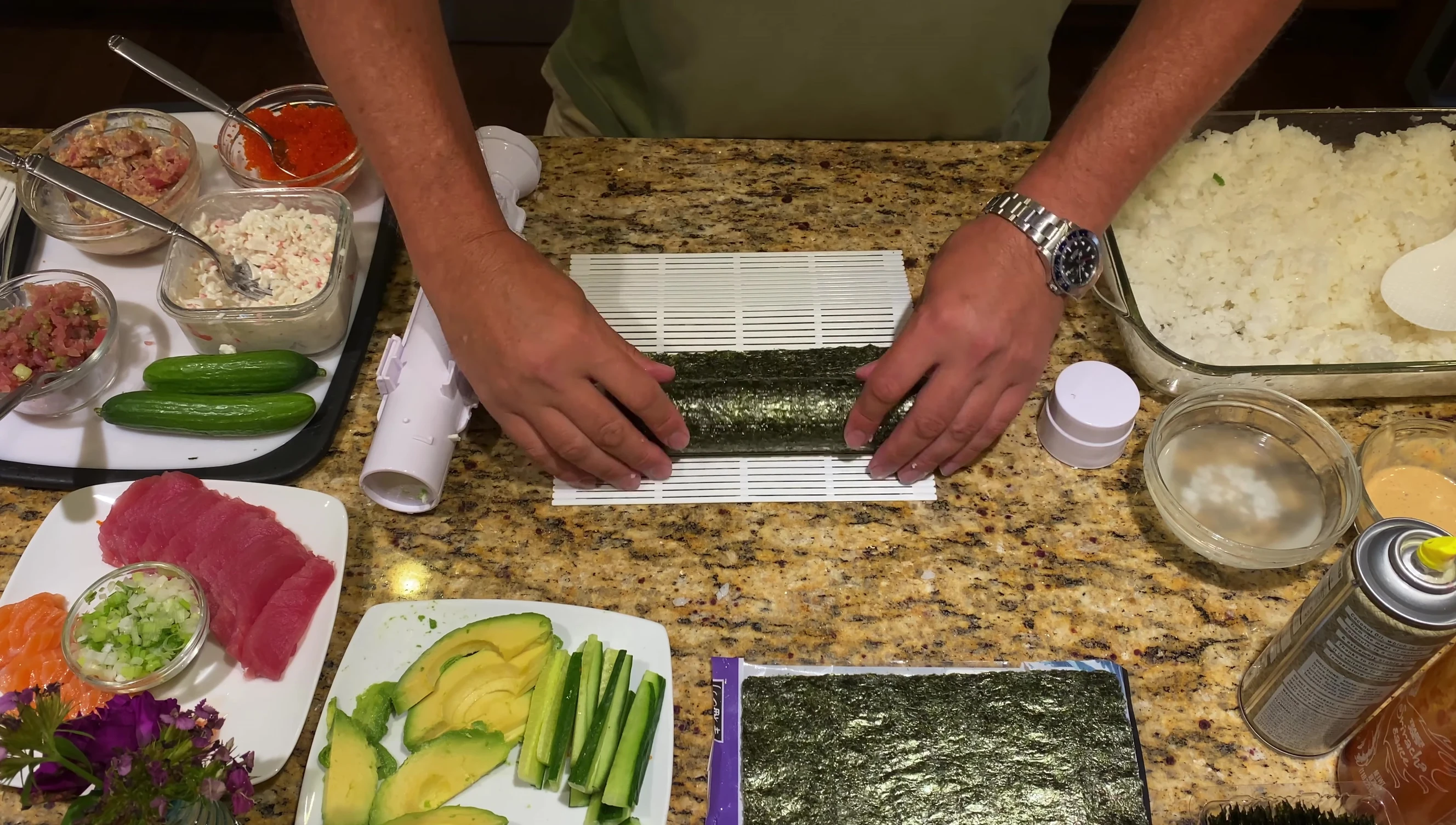 Wetting the nori to help it stick