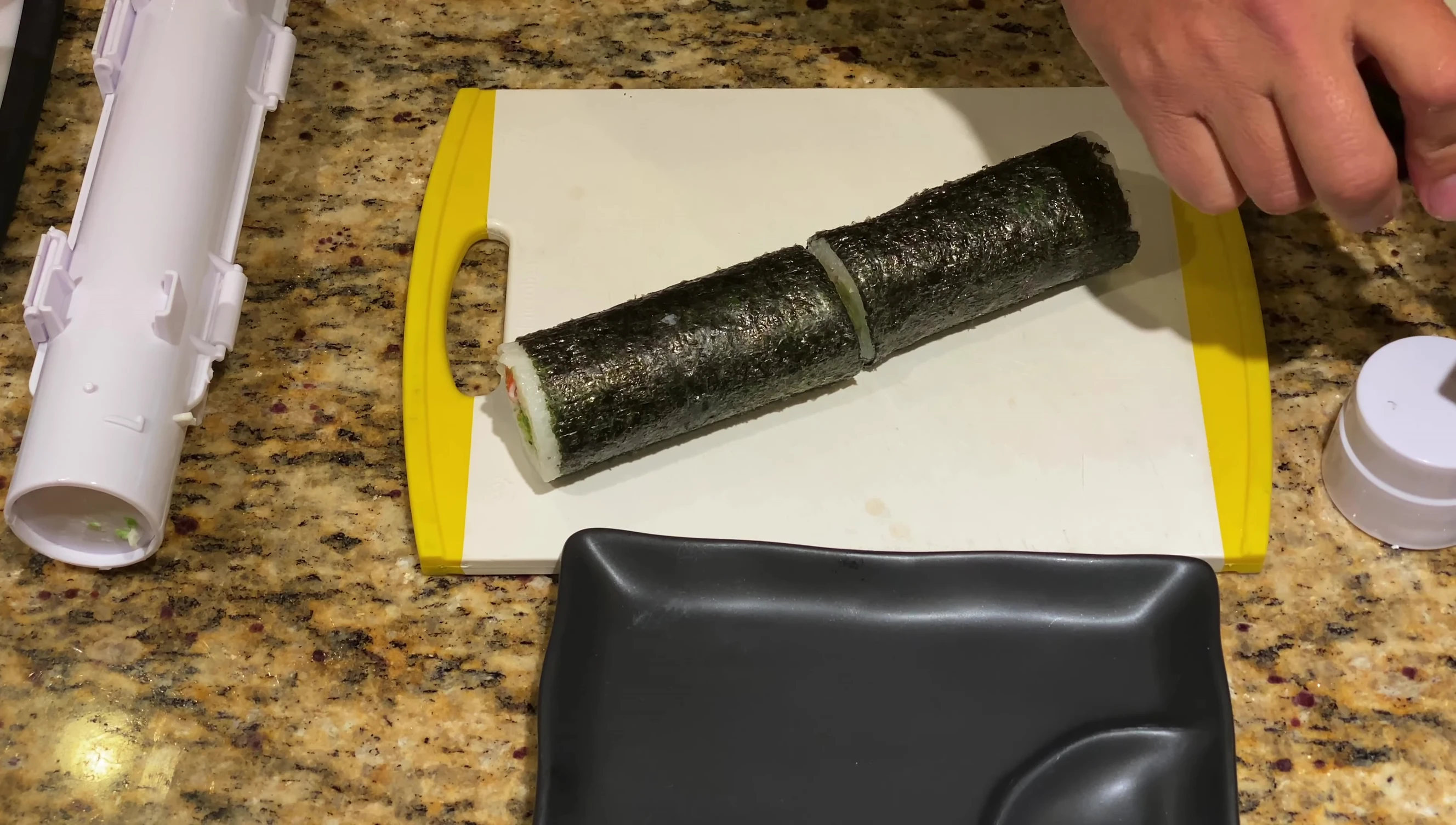 Cutting the sushi roll