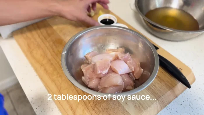 Season the chicken: After brining, drain the chicken and add soy sauce, sake, salt, grated ginger, grated garlic, and beet sugar. Mix well, massage the seasoning into the chicken, cover, and refrigerate for 15 minutes.