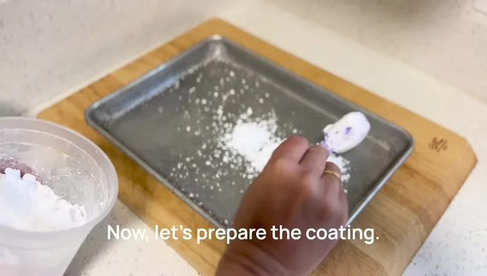 Prepare the coating: Mix potato starch, all-purpose flour, and a pinch of salt in a tray.