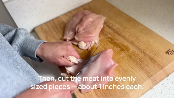Prepare the chicken breast: Remove skin, trim off blood spots, tendons, or bones. Cut into 1-inch pieces.