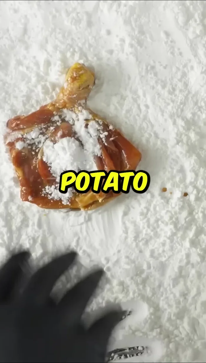 Coat the marinated chicken with potato starch.