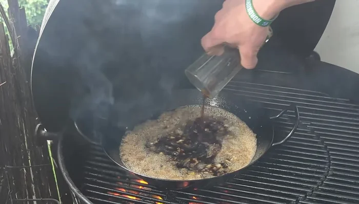 Add a good dash of soy sauce and mirin. Stir.