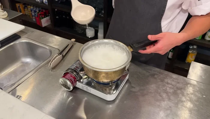 Remove chicken from the boiling water and set aside. Reserve 1 cup of the chicken stock.