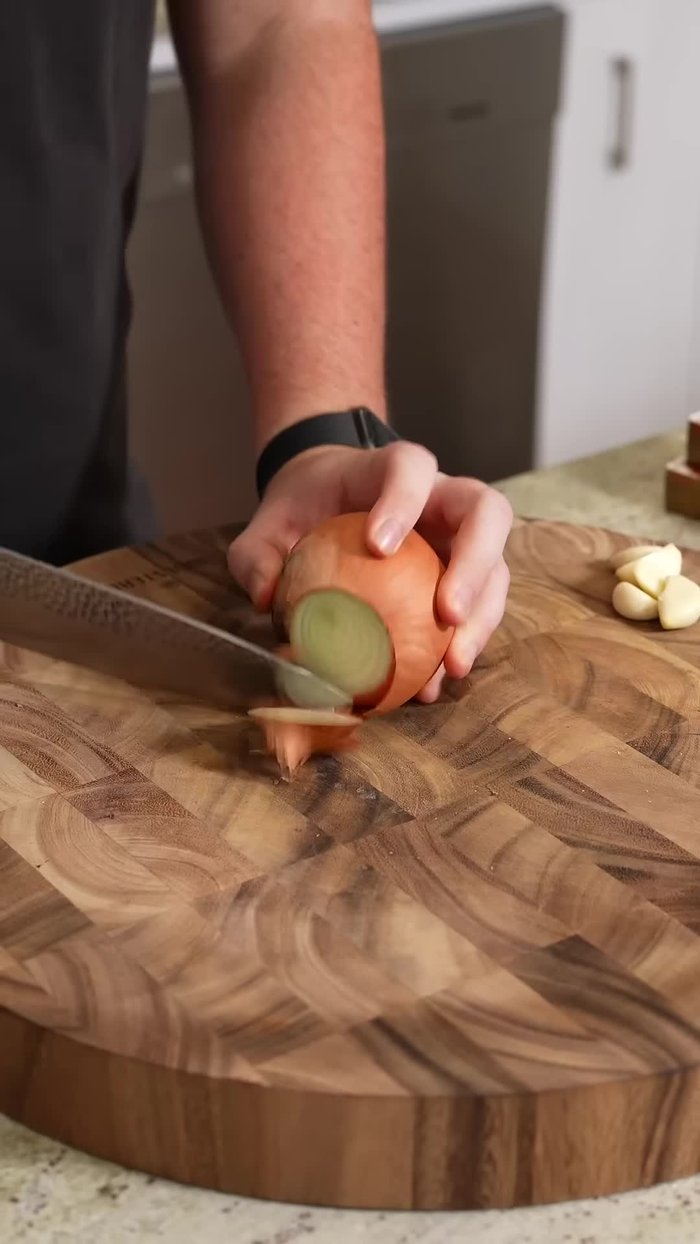 Chop an onion and saute it over medium heat with pepper and salt until translucent.