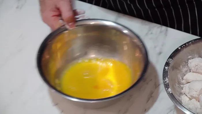 Coat chicken in flour, then egg, then breadcrumbs.