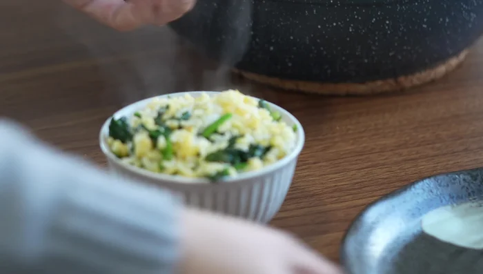 Scoop rice into a small bowl, press down, and invert onto a plate for a neat presentation.