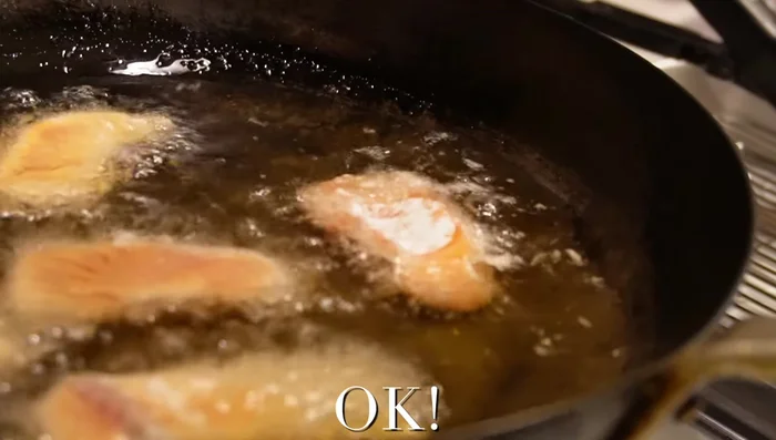 Fry the salmon: Fry the salmon in vegetable oil over medium heat for about 3 minutes until cooked through.