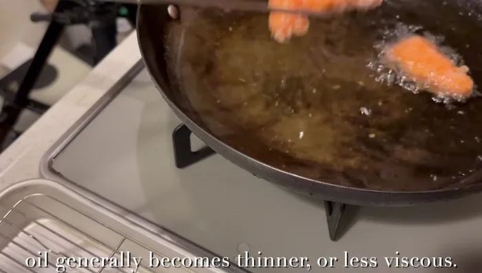 Combine and marinate: Add the hot fried salmon to the cooled sauce, followed by the prepared onion. Mix well. Add lemon slices. Refrigerate for at least 3 hours (preferably overnight).