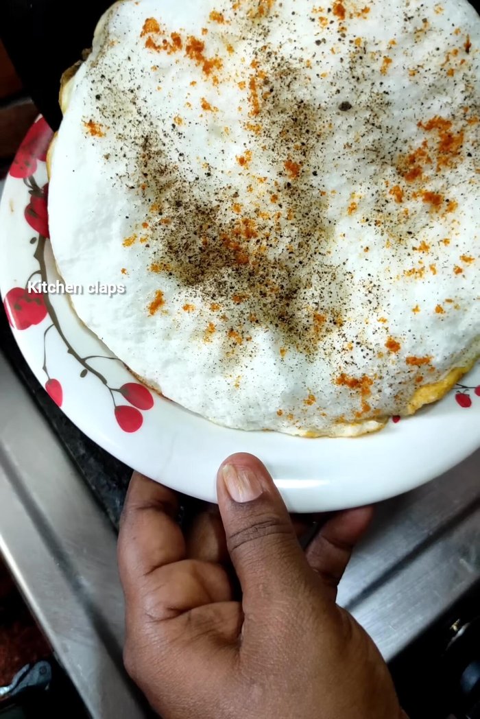 Cook for about three minutes until the omelette is cooked through and soft.