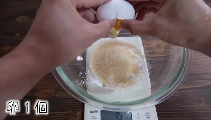 Add one egg.