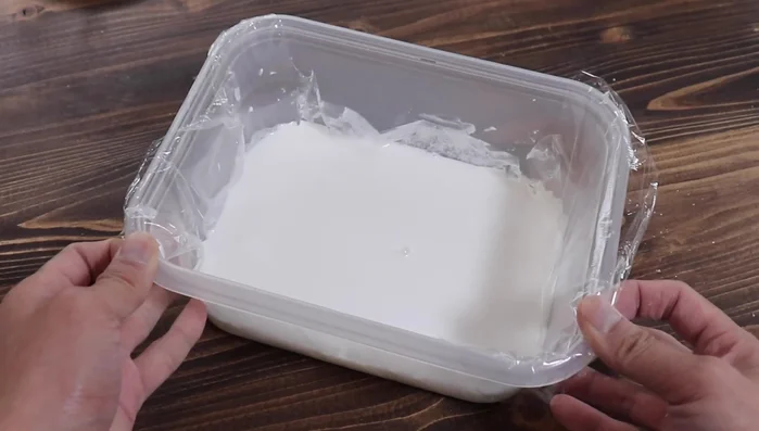 Cover the container with plastic wrap and microwave at 600 watts for 4 minutes.