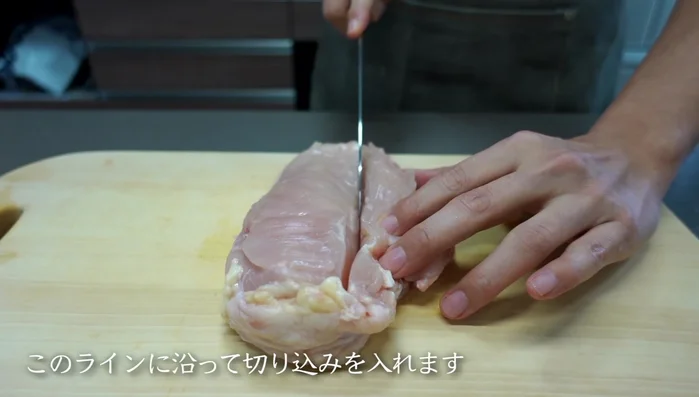 Locate the line in the middle of the chicken breast where the fibers change. Make a cut along this line. Slowly cut open the left side to match the height of the meat on the right. This ensures even thickness for easier cooking.