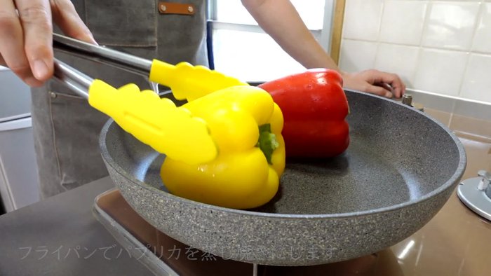 Steam the peppers over medium heat for about 30 seconds. Remove the lid, flip, and brown the entire surface.