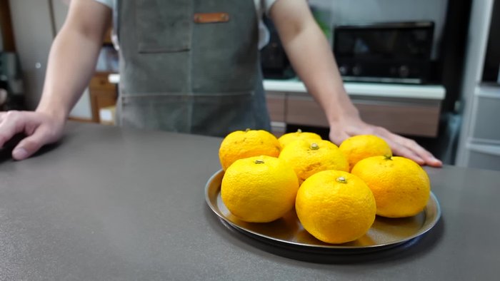 Cook the peel until softened. (Exact cooking time not specified in transcript)