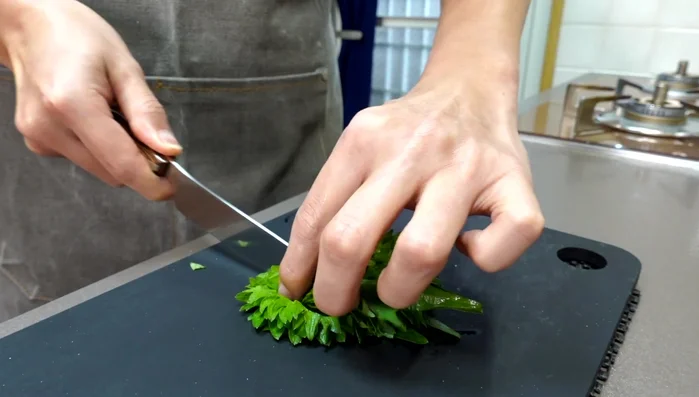 Prepare the over-oroshi (grated daikon radish) by grating the daikon, removing excess moisture, and mixing it with chopped shiso leaves.