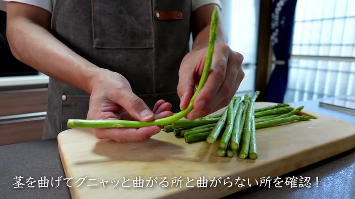 Prepare the asparagus: Bend each stalk to find the tough, stringy parts that won't bend. Cut these off.