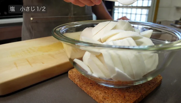 Add the sliced stalks to a bowl and sprinkle with ½ teaspoon of salt. Rub the salt into the stalks to draw out moisture.