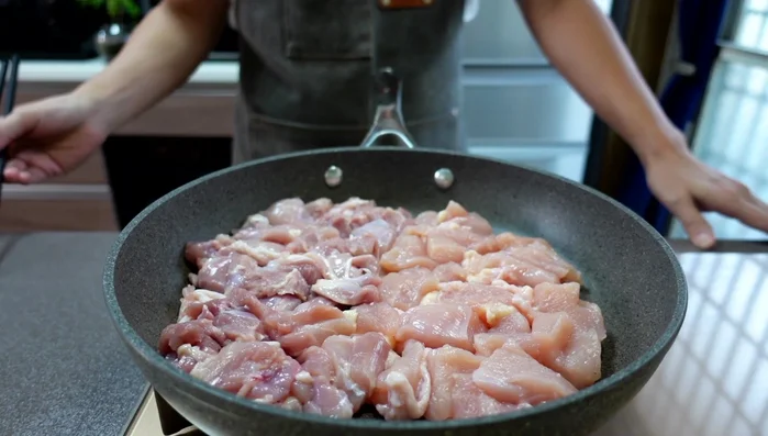 Grill the chicken skin-side down over medium heat, avoiding touching it. The key is to let it cook without disturbance.