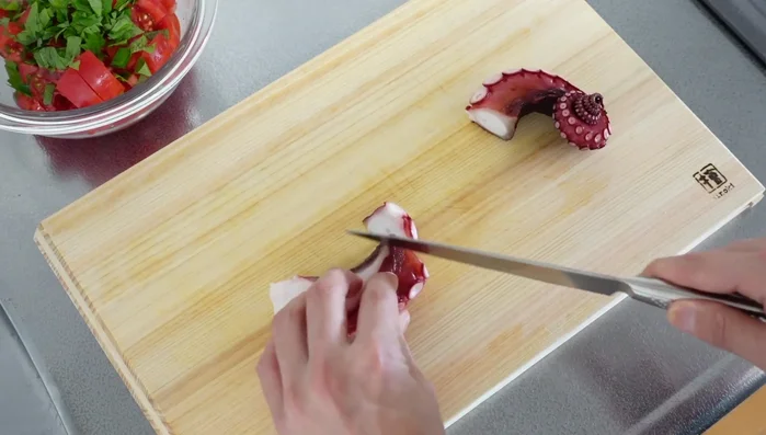 Cut the octopus into bite-sized pieces.