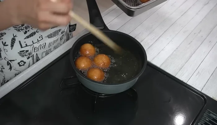 Remove the donuts from the oil and let them drain on a wire rack or paper towel for about 3 minutes.