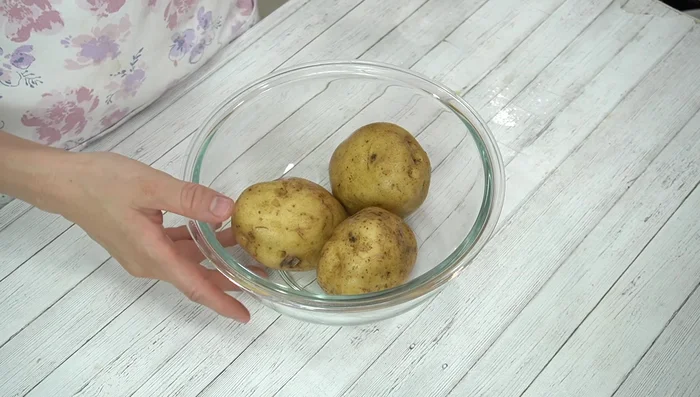 Microwave potatoes until cooked through (8-10 minutes at 600W, adjust time based on potato size).