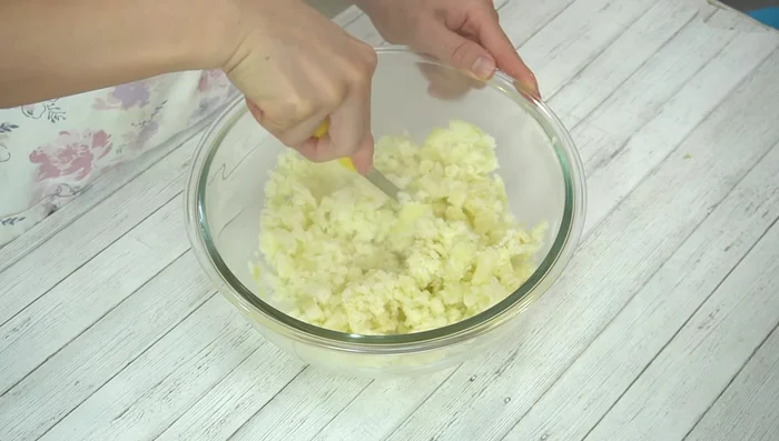 Mix mashed potatoes with the cooked cabbage mixture.