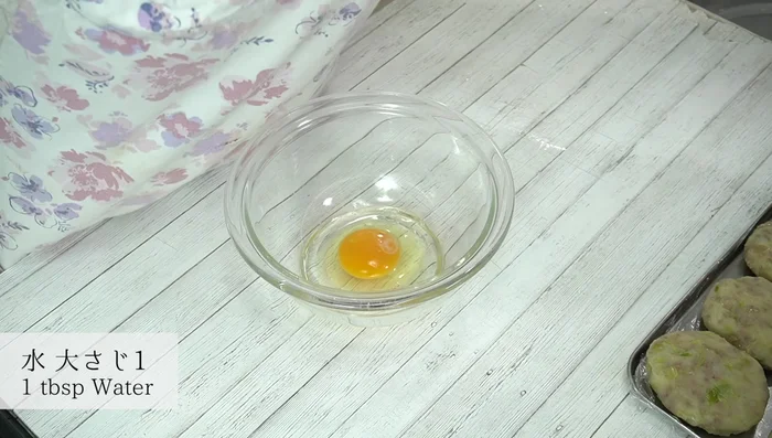 Make the batter by whisking together eggs, water, and flour.