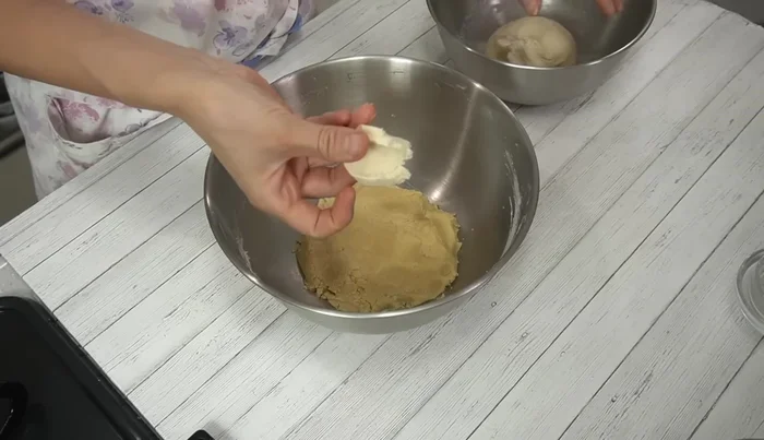 Combine doughs: Gradually add the sponge dough to the main dough, kneading until fully incorporated.