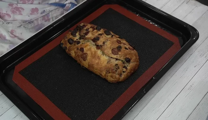 Glaze: While still warm, brush the stollen generously with melted butter, then sprinkle with granulated sugar.