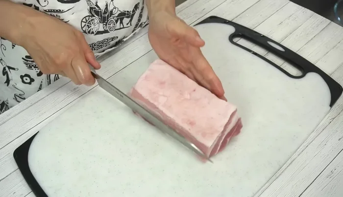 Cut the pork belly block vertically, then in half lengthwise. Cut into pieces just under 2cm wide.