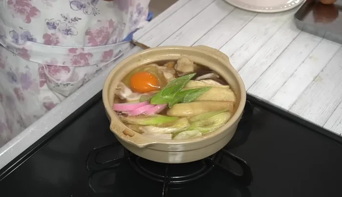 Garnish with the reserved green onion tops.
