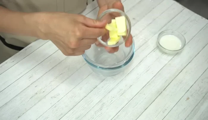Prepare the sponge cake ingredients. Melt butter and milk in a double boiler.