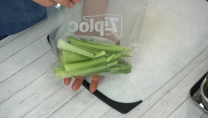 Place the stems in a ziploc bag, add salt, and mix well. Let it sit for 10 minutes.