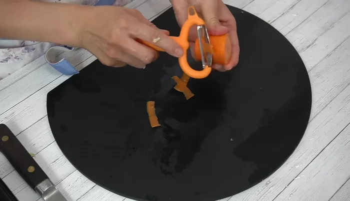 Peel and thinly slice the carrots, then cut lengthwise into 1cm wide pieces.