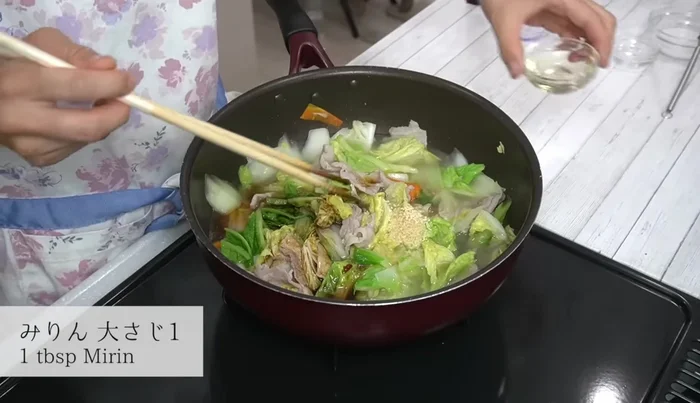 Add water, chicken stock, soy sauce, and mirin. Bring to a boil, then cover and simmer for 5 minutes on low heat.