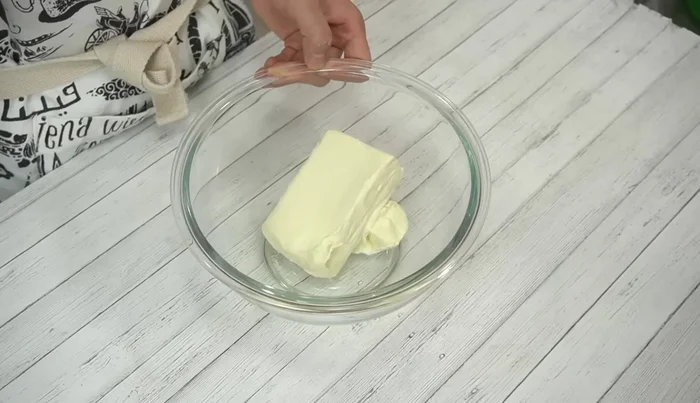 Soften cream cheese (at room temperature or microwaved briefly). Add half the granulated sugar and mix until smooth.