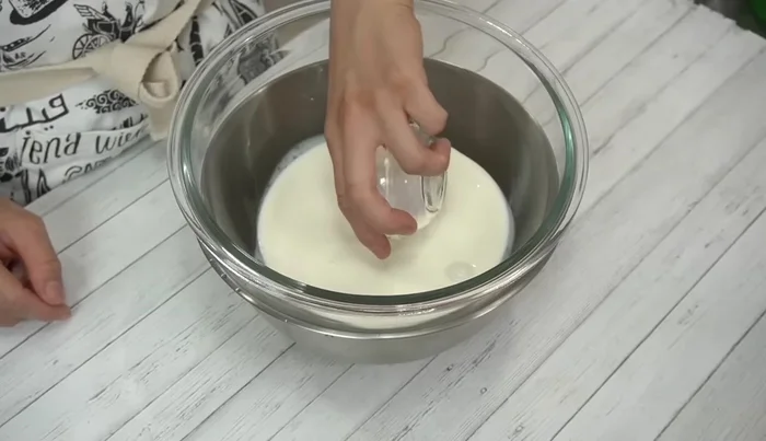 Whip cream in an ice bath until stiff peaks form. Add remaining sugar. Gently fold 1/3 of the whipped cream into the cream cheese, then add the remaining cream in two additions, mixing gently after each.