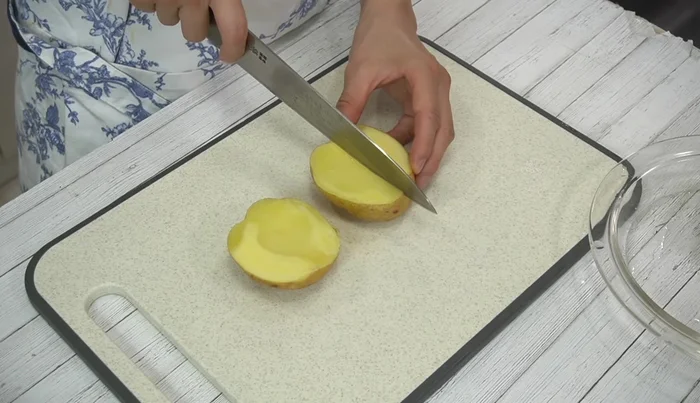 Cut potatoes into 8 equal pieces. (Heating whole potatoes before cutting prevents them from losing their shape)